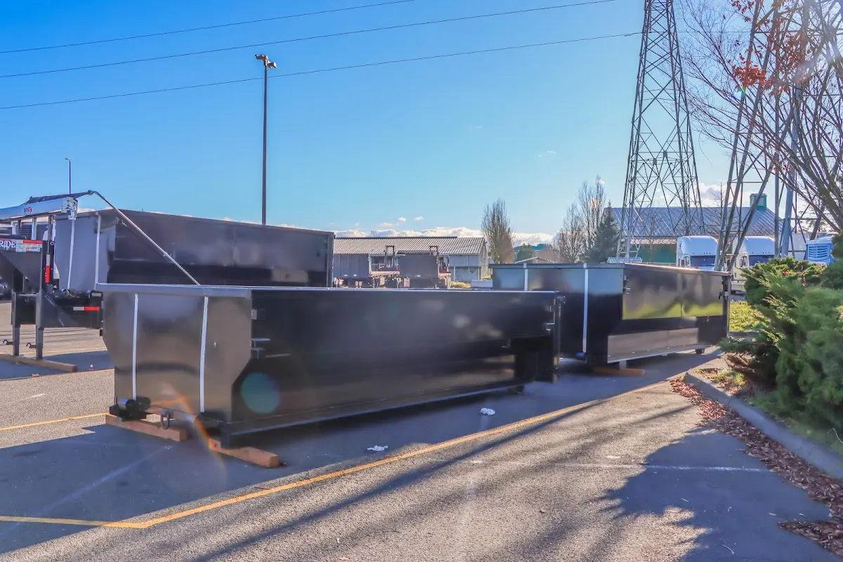 Roll-off dumpster ready for waste disposal at job site for 4 Yard Dumpster Rental in Sturbridge